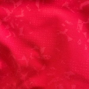 Lululemon size 12 leggings with pockets. Beautiful red with subtle design.